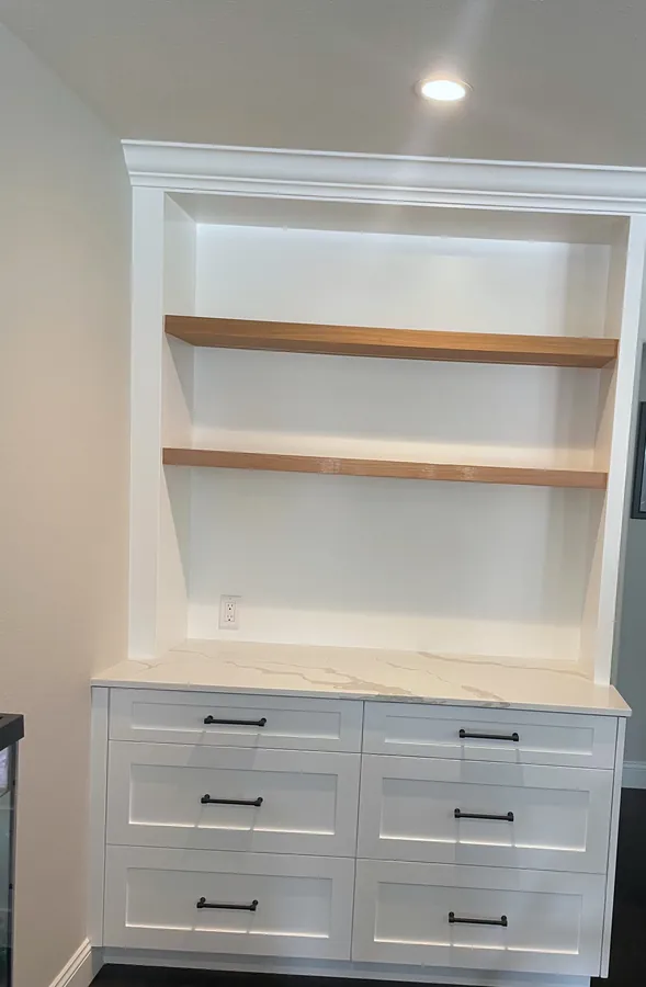 White hutch with wood open shelves over a drawer base