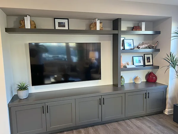 Charcoal media console with floating shelves above, Camarillo