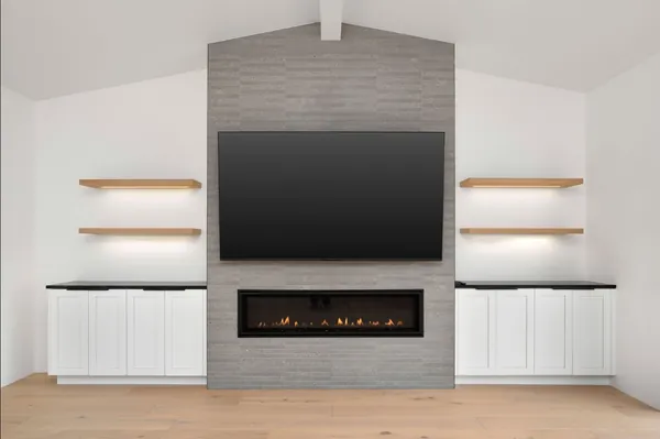 White built-ins with floating shelves on both sides of a linear fireplace and TV wall, Thousand Oaks