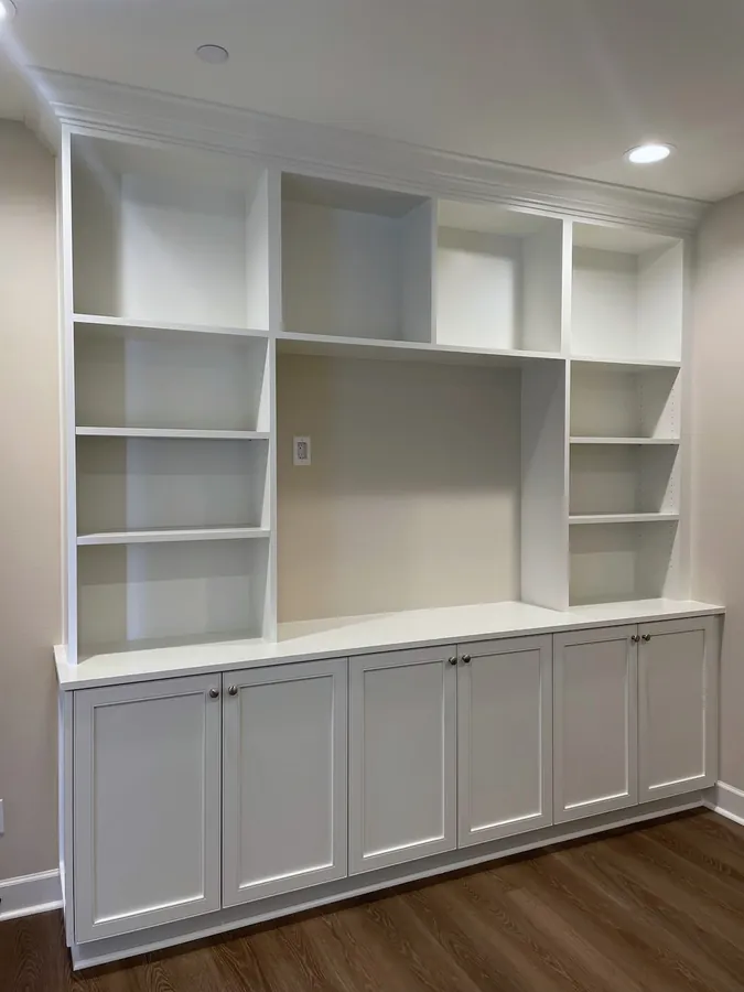 White built-in with open shelving over shaker base cabinets