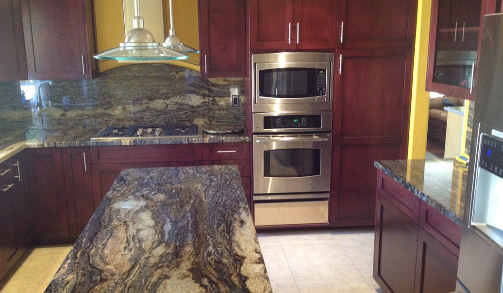 Frameless Alder Kitchen with Shaker Style doors with a Merlot Lacquer Finish