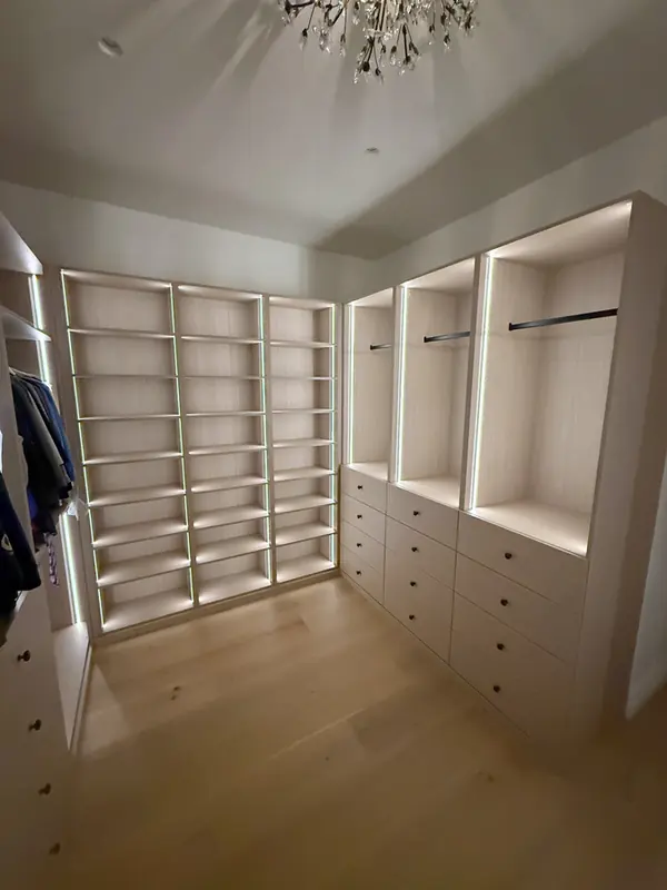 Walk-in closet with LED-lit shoe shelves, drawer stacks and open hanging, Thousand Oaks