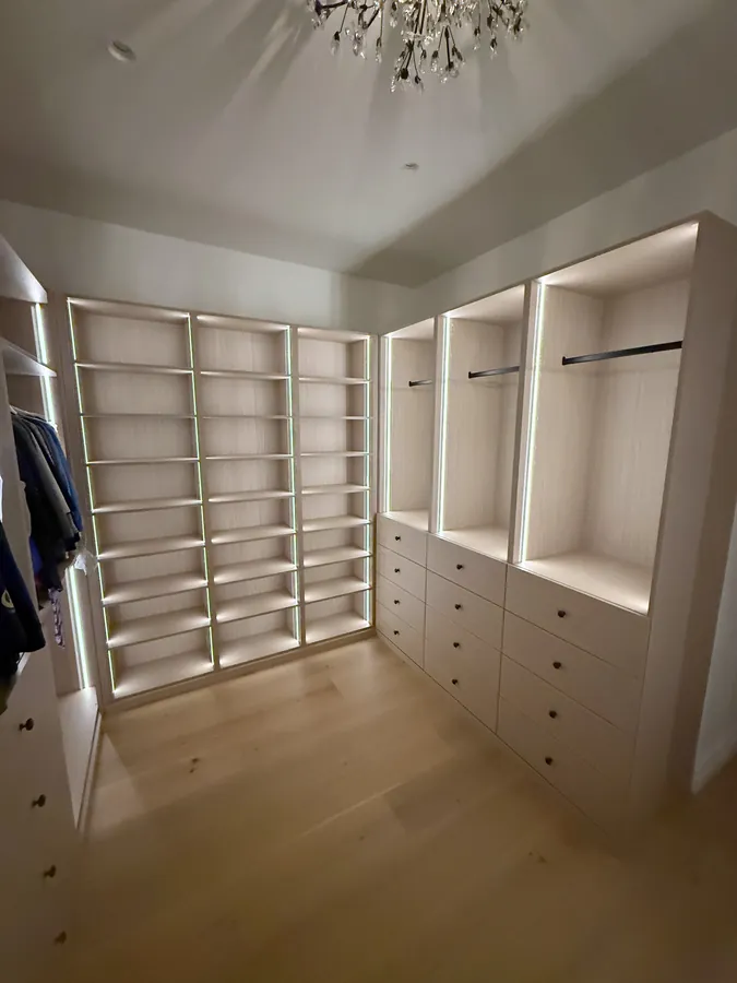 Walk-in closet with LED-lit shoe shelves, drawer stacks and open hanging, Thousand Oaks