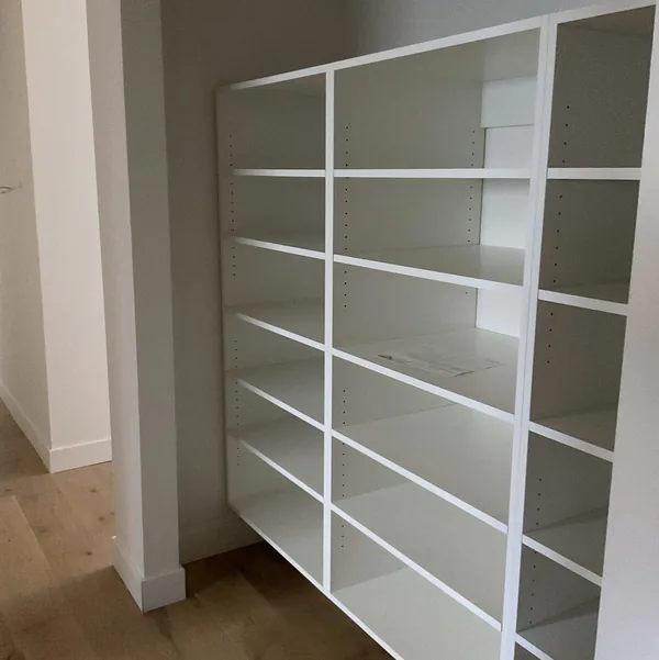 White multi-bay closet shelving