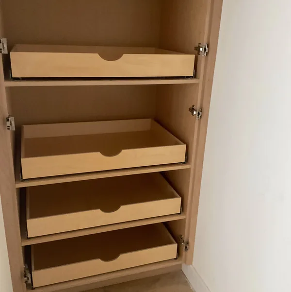 White oak pull-out trays with finger pulls