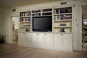 Traditional Paint Grade Entertainment Center with an Antique White Lacquer Finish
