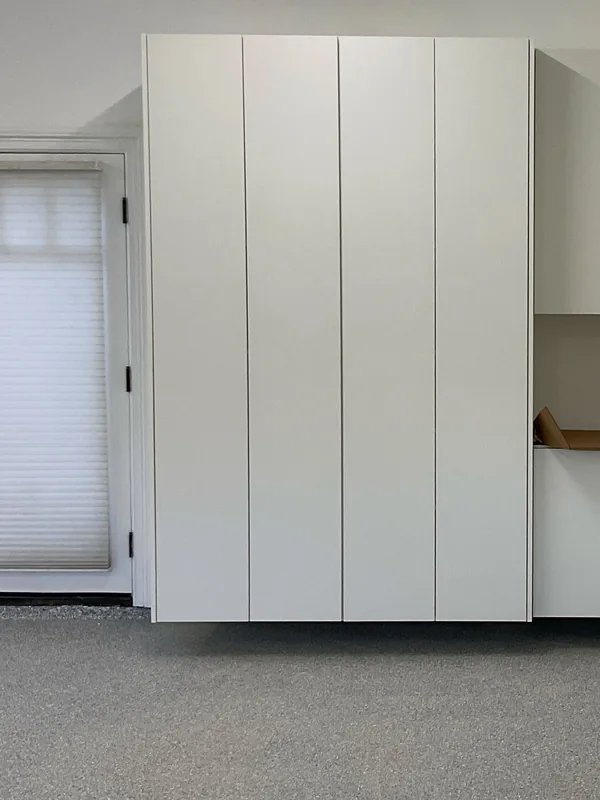 Wall of tall white flat-panel cabinets, Hidden Hills