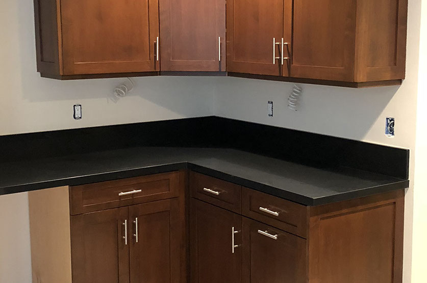 Traditional Paint Grade Entertainment Center with an Antique White Lacquer Finish