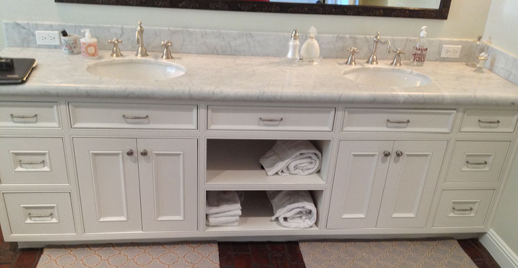 Beaded Inset Paint Grade Bathroom Vanity with a Swiss Coffee Lacquer Finish