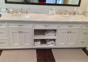 Beaded Inset Paint Grade Bathroom Vanity with a Swiss Coffee Lacquer Finish