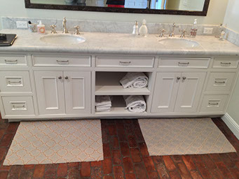 Beaded Inset Paint Grade Bathroom Vanity with a Swiss Coffee Lacquer Finish
