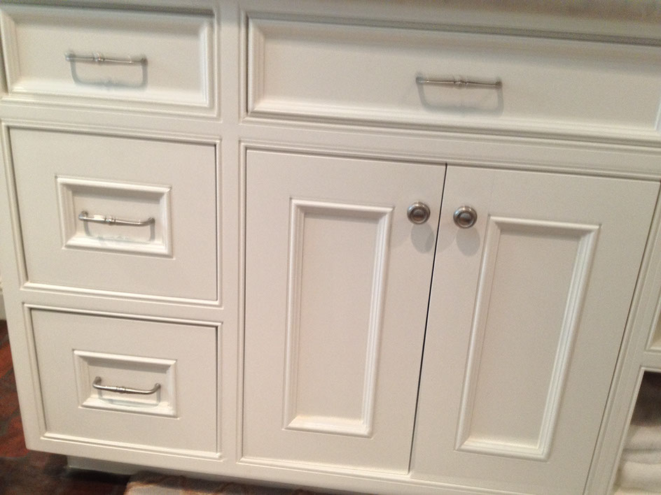 Beaded Inset Paint Grade Bathroom Vanity with a Swiss Coffee Lacquer Finish