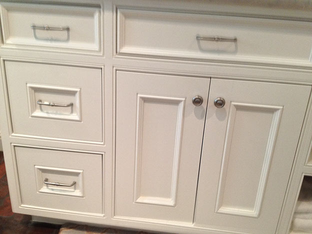 Beaded Inset Paint Grade Bathroom Vanity with a Swiss Coffee Lacquer Finish