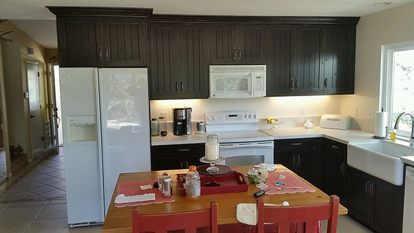 Frameless Alder Kitchen with Shaker Style doors with a Merlot Lacquer Finish