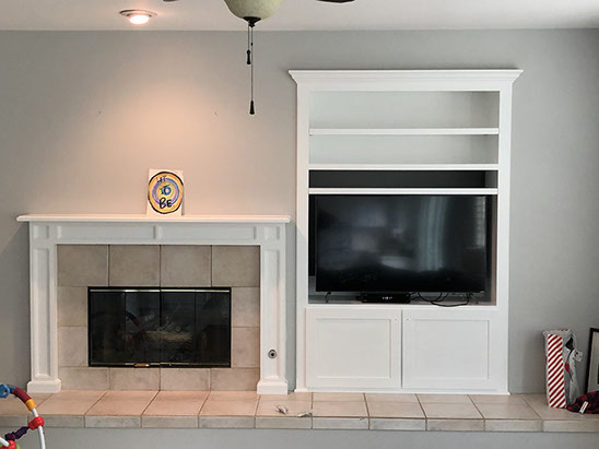 Traditional Paint Grade Entertainment Center with an Antique White Lacquer Finish