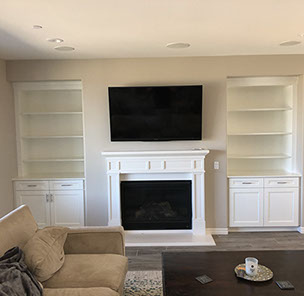 Traditional Paint Grade Entertainment Center with an Antique White Lacquer Finish