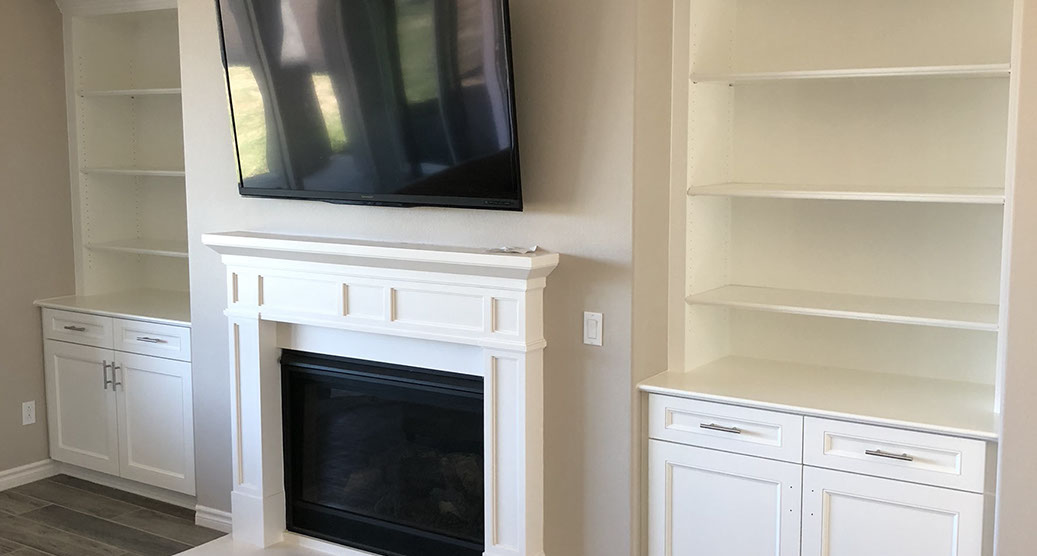 Traditional Paint Grade Entertainment Center with an Antique White Lacquer Finish