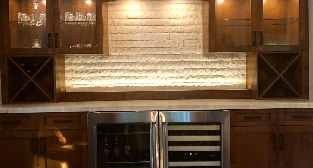 Traditional Paint Grade Entertainment Center with an Antique White Lacquer Finish