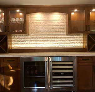 Traditional Paint Grade Entertainment Center with an Antique White Lacquer Finish