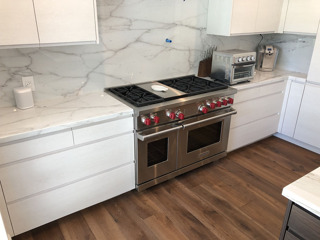 Frameless Alder Kitchen with Shaker Style doors with a Merlot Lacquer Finish
