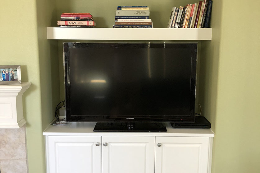 Traditional Paint Grade Entertainment Center with an Antique White Lacquer Finish