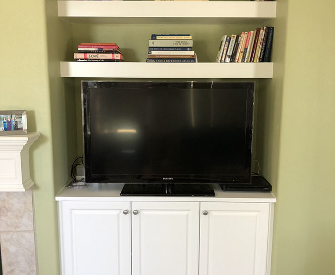 Traditional Paint Grade Entertainment Center with an Antique White Lacquer Finish