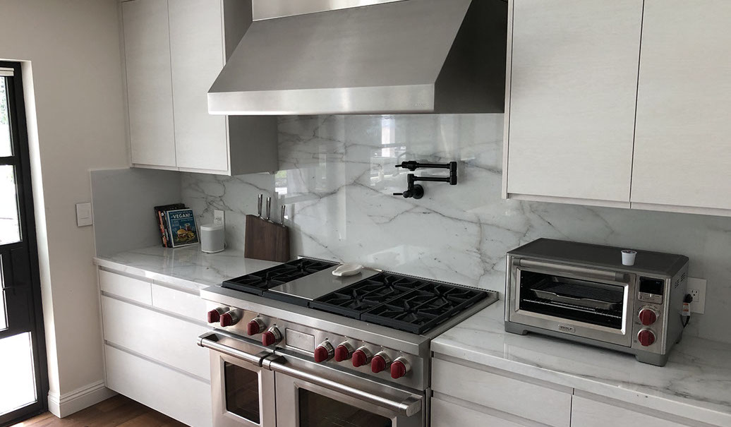 Frameless Alder Kitchen with Shaker Style doors with a Merlot Lacquer Finish