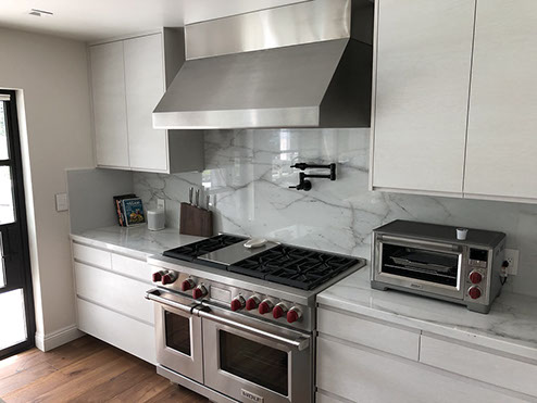 Frameless Alder Kitchen with Shaker Style doors with a Merlot Lacquer Finish