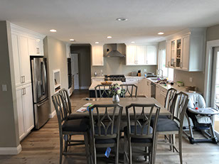 Frameless Alder Kitchen with Shaker Style doors with a Merlot Lacquer Finish
