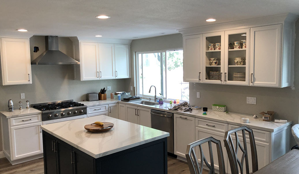 Frameless Alder Kitchen with Shaker Style doors with a Merlot Lacquer Finish