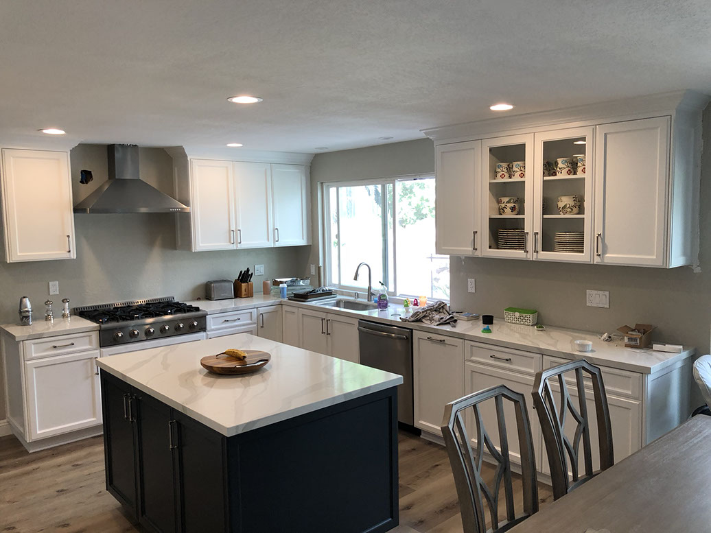 Frameless Alder Kitchen with Shaker Style doors with a Merlot Lacquer Finish