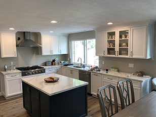 Frameless Alder Kitchen with Shaker Style doors with a Merlot Lacquer Finish