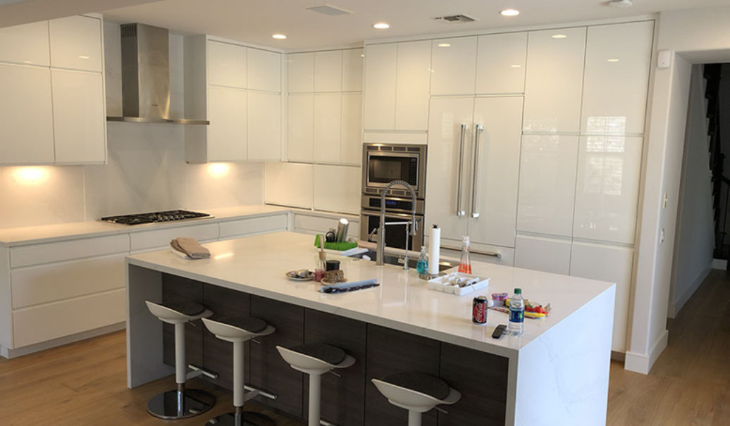 Frameless Alder Kitchen with Shaker Style doors with a Merlot Lacquer Finish