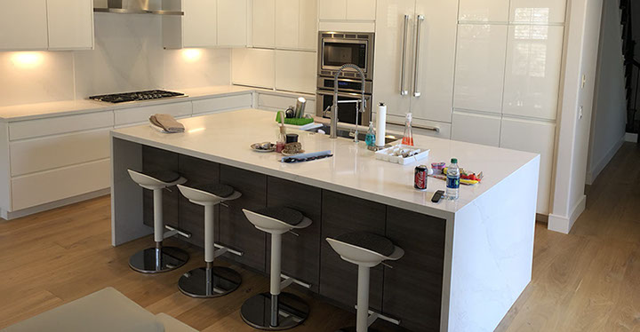 Frameless Alder Kitchen with Shaker Style doors with a Merlot Lacquer Finish