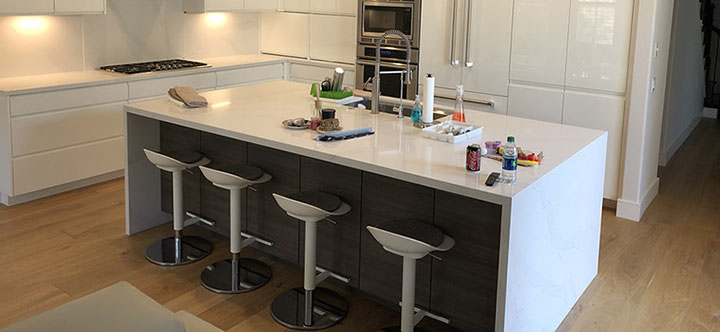 Frameless Alder Kitchen with Shaker Style doors with a Merlot Lacquer Finish