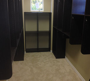 Custom Paint Grade Wainscoting and Crown Molding with a Swiss Coffee Lacquer Finish.