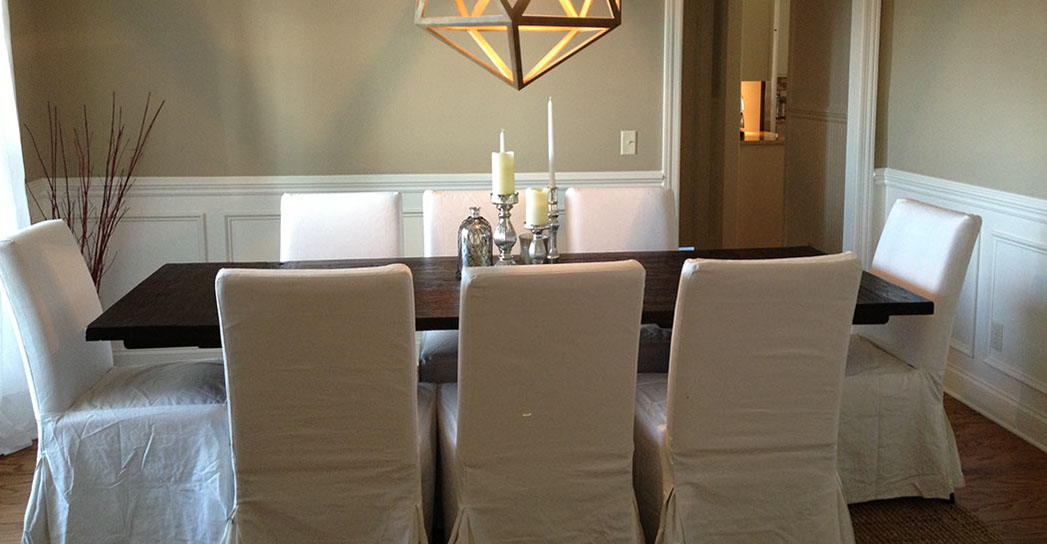 Custom Paint Grade Wainscoting and Crown Molding with a Swiss Coffee Lacquer Finish.