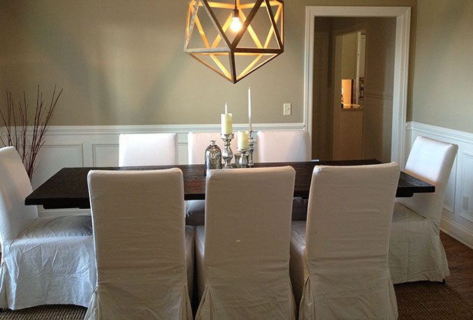 Custom Paint Grade Wainscoting and Crown Molding with a Swiss Coffee Lacquer Finish.