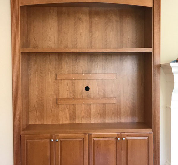 Traditional Paint Grade Entertainment Center with an Antique White Lacquer Finish