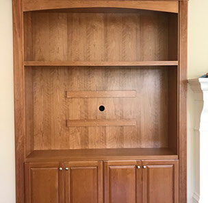 Traditional Paint Grade Entertainment Center with an Antique White Lacquer Finish