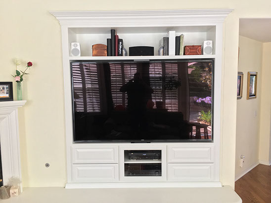 Traditional Paint Grade Entertainment Center with an Antique White Lacquer Finish