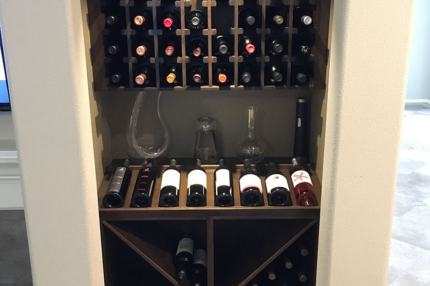 Traditional Paint Grade Entertainment Center with an Antique White Lacquer Finish