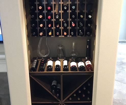 Traditional Paint Grade Entertainment Center with an Antique White Lacquer Finish