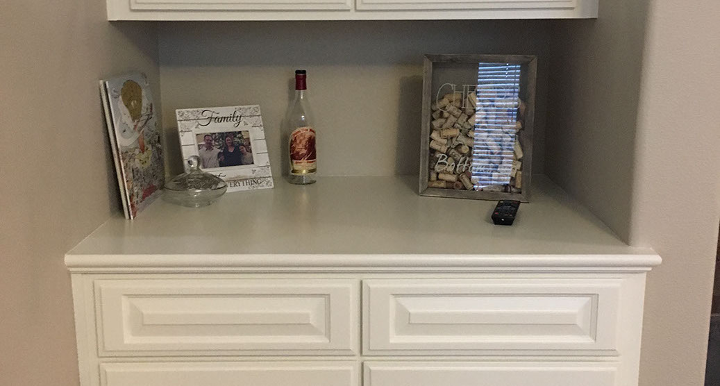 Traditional Paint Grade Entertainment Center with an Antique White Lacquer Finish