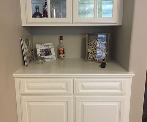 Traditional Paint Grade Entertainment Center with an Antique White Lacquer Finish