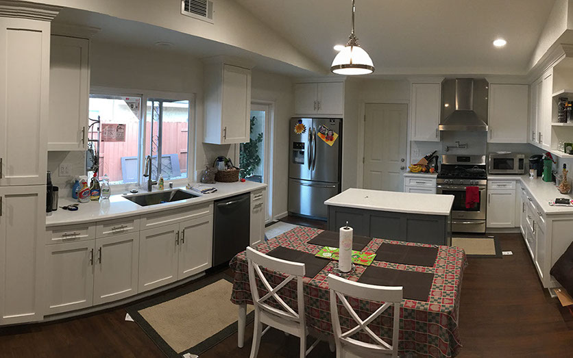 Frameless Alder Kitchen with Shaker Style doors with a Merlot Lacquer Finish