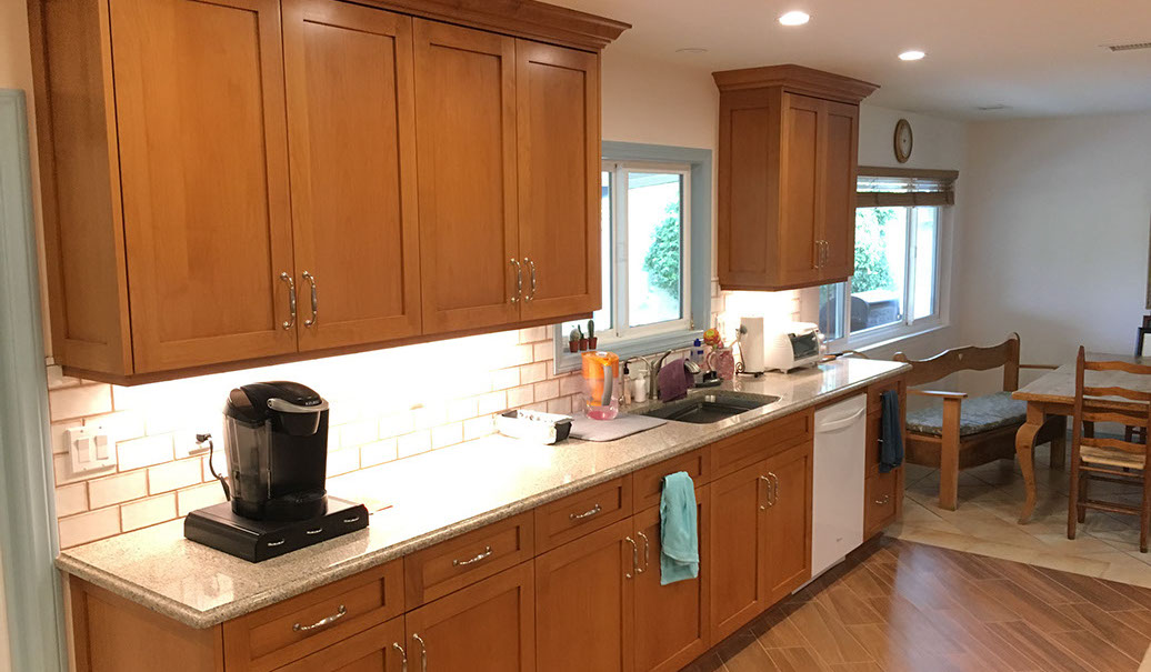 Frameless Alder Kitchen with Shaker Style doors with a Merlot Lacquer Finish