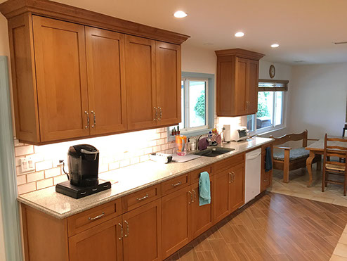 Frameless Alder Kitchen with Shaker Style doors with a Merlot Lacquer Finish