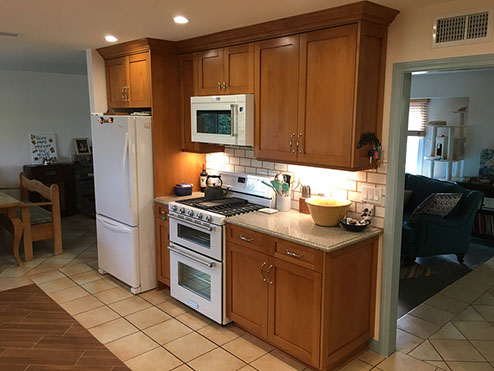 Frameless Alder Kitchen with Shaker Style doors with a Merlot Lacquer Finish