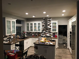 Frameless Alder Kitchen with Shaker Style doors with a Merlot Lacquer Finish